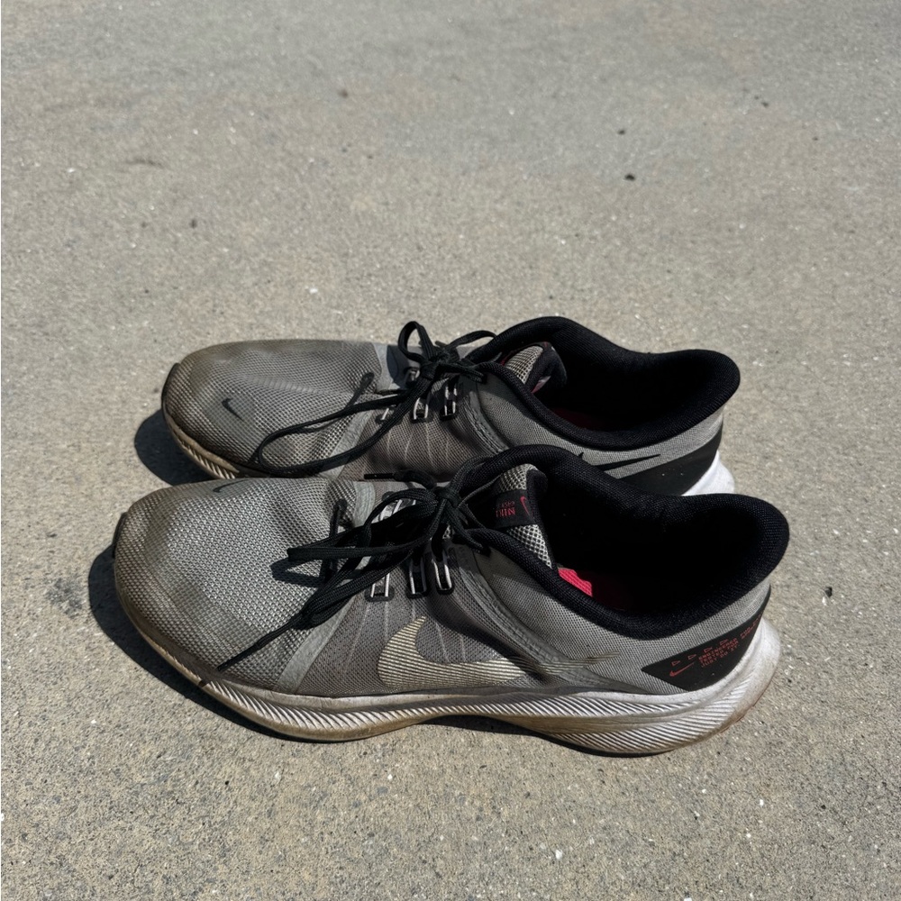 Nike Black and Gray Athletic Shoes with Modern Design